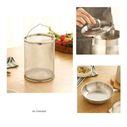 Metal mesh strainer, oil strainer, and other kitchen utensils on a wooden surface.